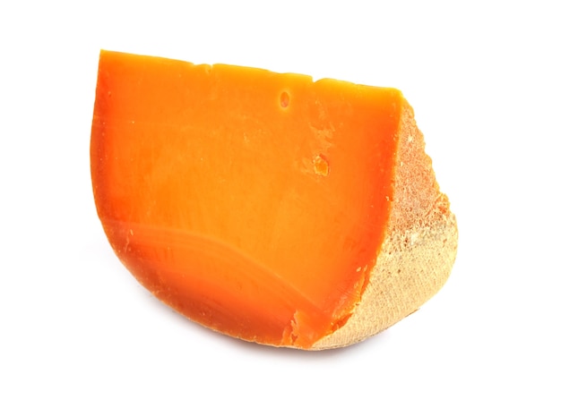 Teil des Mimolette-Käses isoliert