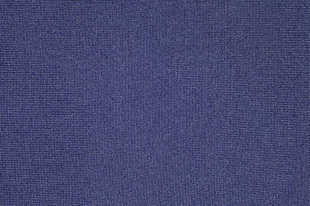 Tejido azul oscuro primer plano superficie tejida fondo papel tapiz patrón de textura uniforme