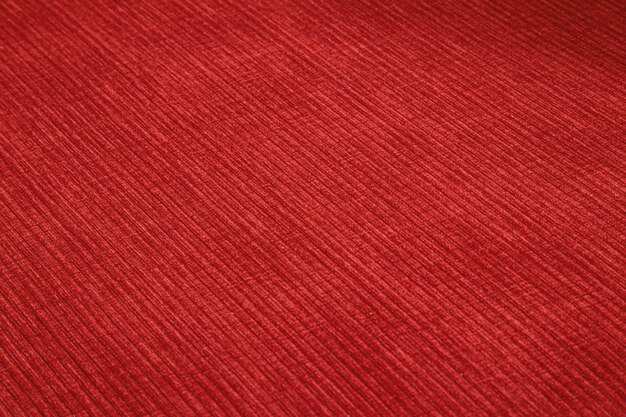 Foto tejido de muebles de corduroy texturizado en colores rojos