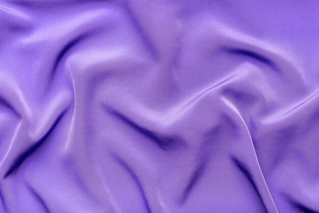 Tela elegante sedosa púrpura como fondo