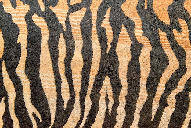 Foto tela con fondo de rayas de tigre.
