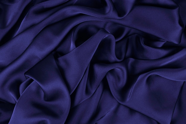 Tela de fondo. Tejido textil oscuro con textura y fondo de cortinas de patrón