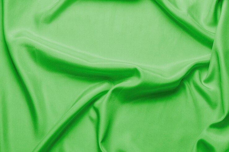 Foto tela de seda lisa o estatina verde con ondas