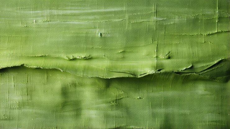 Foto una tela verde con un borde roto