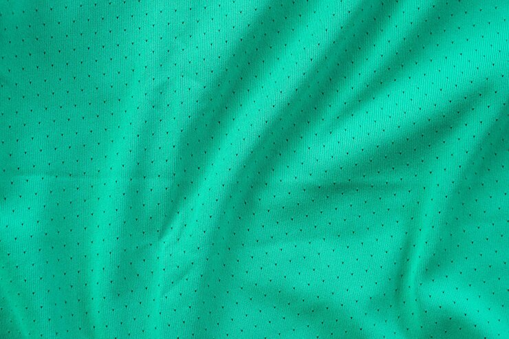 Foto tela verde de ropa deportiva camiseta de fútbol fondo de textura de la camiseta