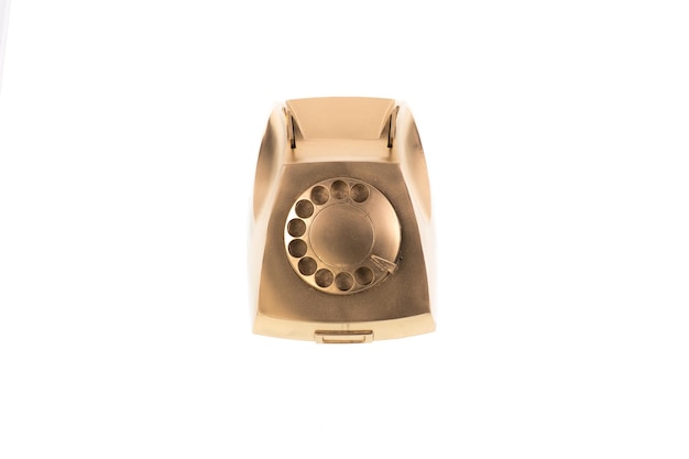 telefone dourado isolado no fundo branco