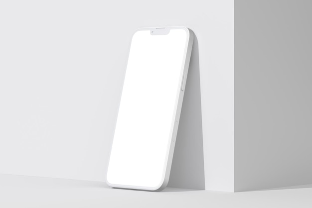 Foto un teléfono blanco con una pantalla en blanco está sobre una superficie blanca.