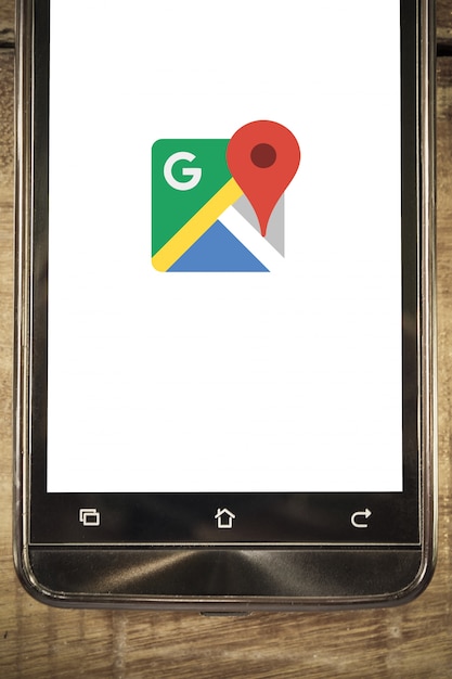 Foto teléfono inteligente pantalla fondo de la aplicación google maps