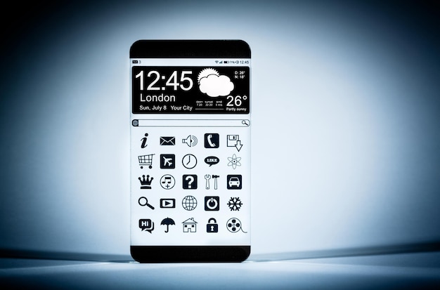Foto teléfono inteligente (phablet) con una pantalla transparente sobre un fondo azul. concepto de ideas innovadoras futuras reales y las mejores tecnologías de la humanidad.
