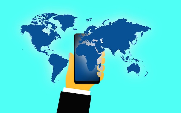 Teléfono móvil en una mano con mapa del mundo