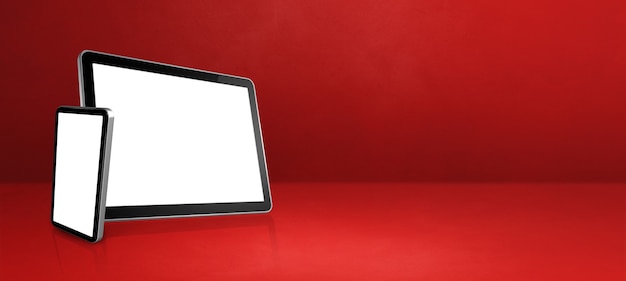 Teléfono móvil y tableta digital en el escritorio de oficina rojo. Banner de fondo horizontal. Ilustración 3D