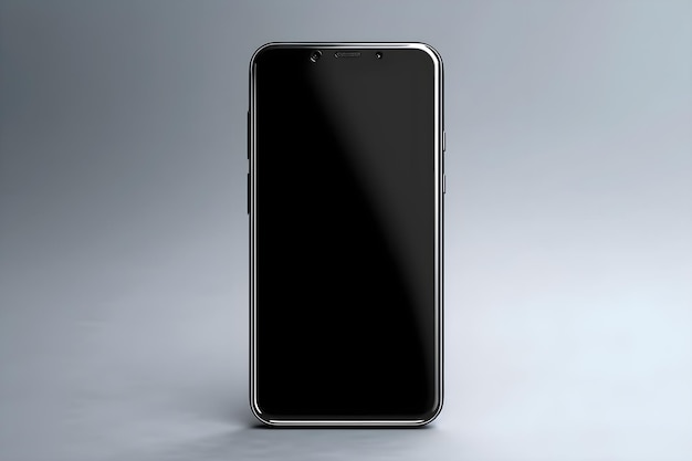 Un teléfono negro con una pantalla en blanco está sobre un fondo gris.