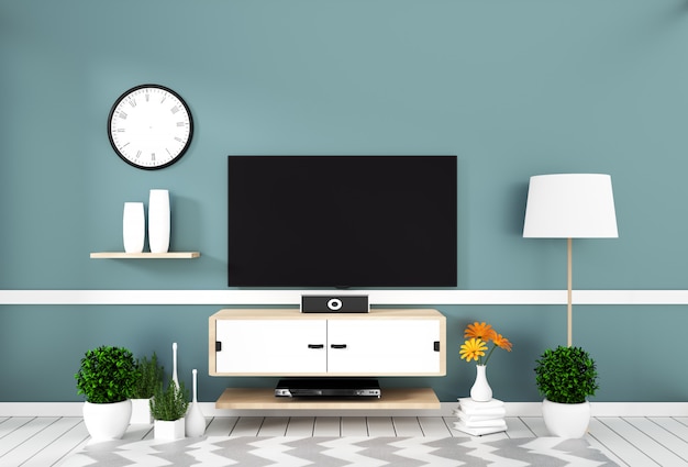Televisor inteligente con pantalla en blanco colgada en la menta de la pared en una maqueta de piso de madera blanca