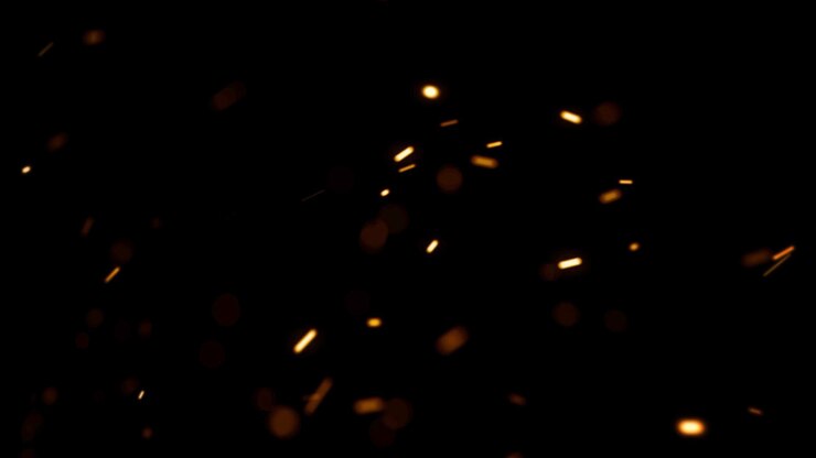 Foto tema cinematográfico com brilho com partículas e fundo escuro
