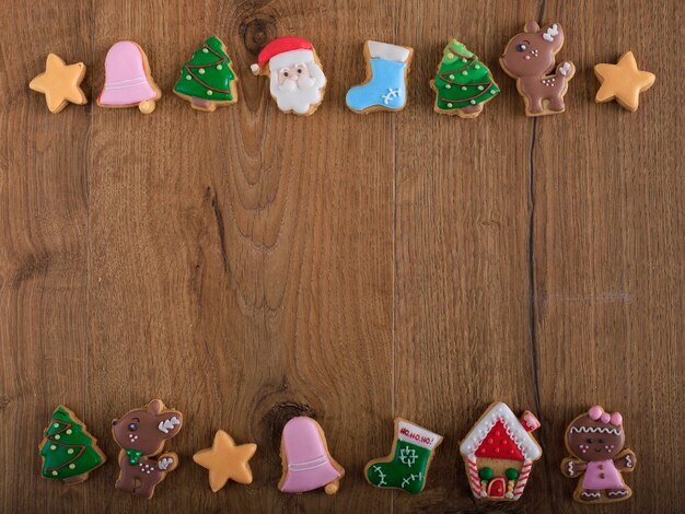 Tema de biscoito de açúcar de Natal, vista superior no fundo Woden