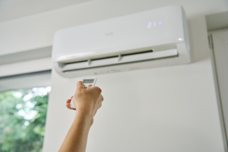 Foto temperatur der klimaanlage mit fernbedienung einstellen