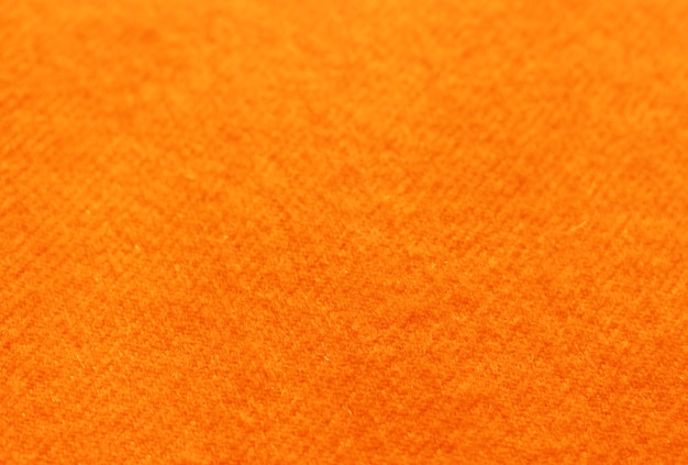 Tendência russet laranja de lã de malha de fundo, textura, close-up