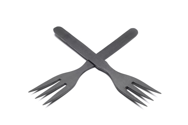 Tenedor de madera negro aislado en blanco Utensilio de cocina