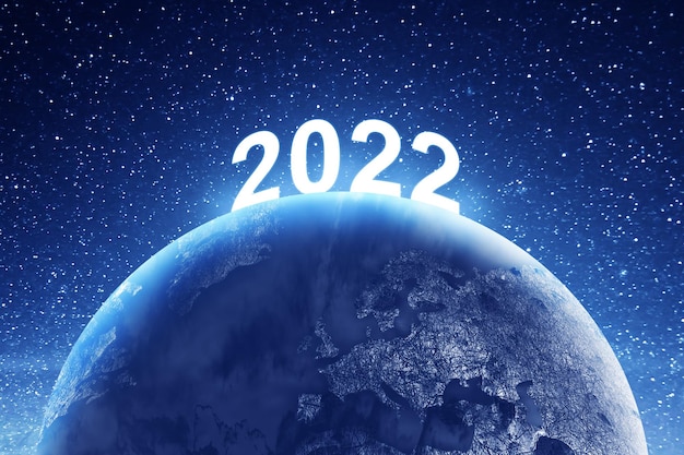 Foto terra com 2022 e plano de fundo da cena noturna. feliz ano novo 2022