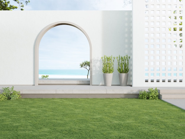 Terraza con piso de concreto y pared de bloque de ventilación blanca en hotel de lujo o casa de playa