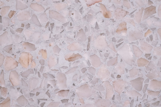 Terrazo pulido piso y pared de piedra patrón y superficie de color mármol y piedra de granito, material para la decoración de fondo de textura.