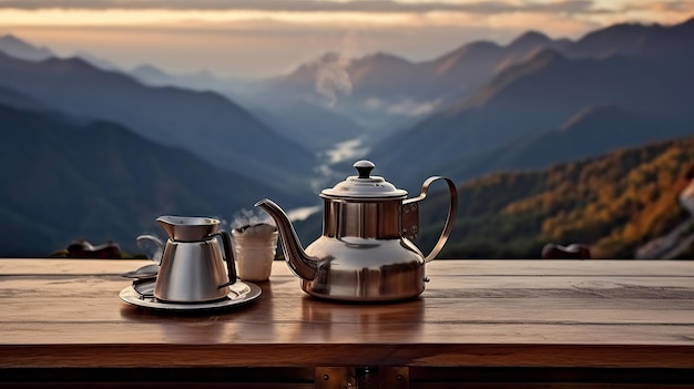 Una tetera y un café se sientan en una terraza de madera con vistas a una montaña