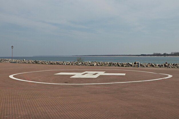 Foto text auf dem strand gegen den himmel