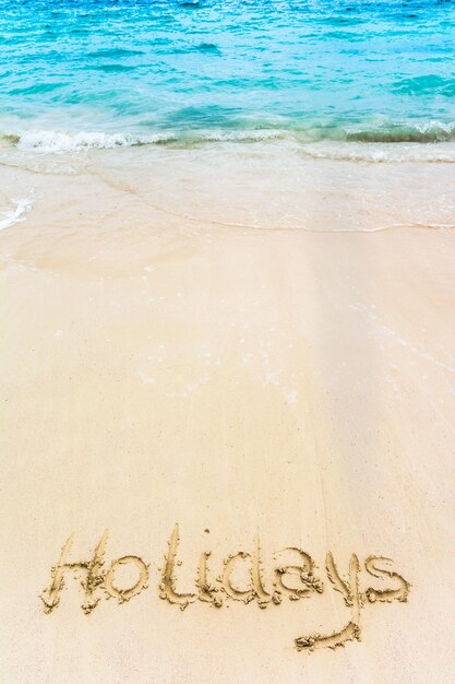 Foto text auf sand am strand