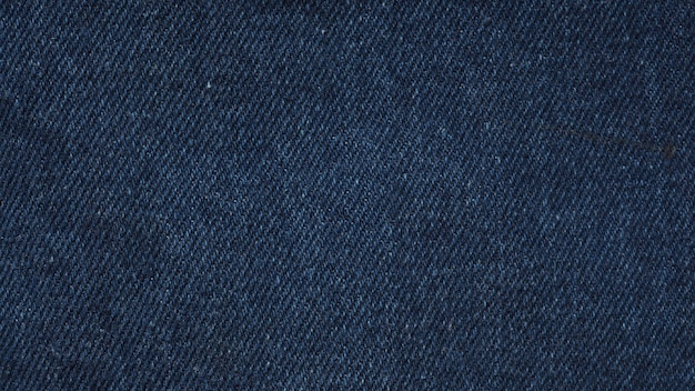 Foto têxteis de jeans azul índigo para textura e plano de fundo.