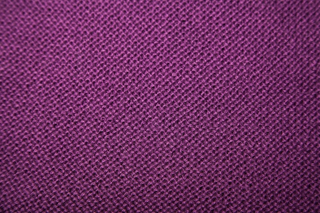 Textil púrpura con textura decorativa abstracta