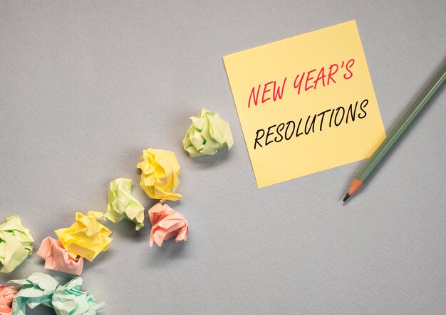 Texto de conceito de resoluções de ano novo em papel