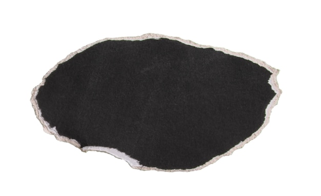 Texto enmarcado en papel negro desgarrado en forma de una plantilla de papel antiguo en blanco Ellipse