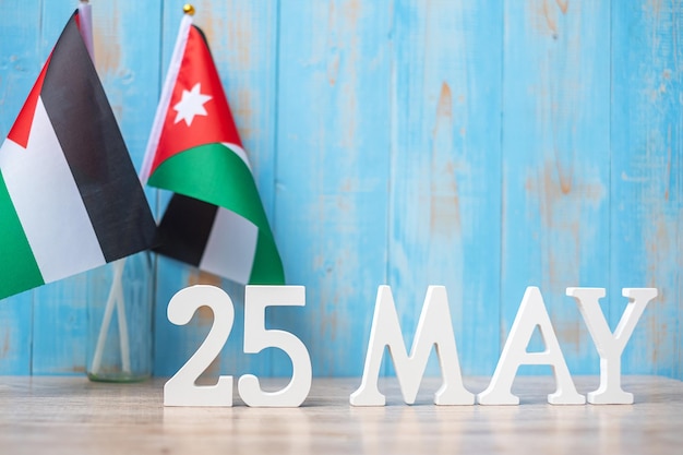 Texto de madera del 25 de mayo con banderas de Jordania Día de la Independencia de Jordania y conceptos de celebración feliz