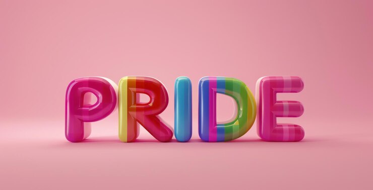 Foto texto de orgullo colorido en letras de arco iris en negrita en un fondo rosado