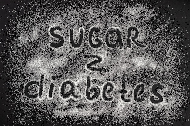 Texto Sugar - Diabetes en una dispersión de cristales de azúcar, blac