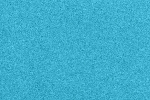 Textur aus hellblauen und türkisfarbenen Farben Papierhintergrund Makro Struktur aus dichtem himmelblauem Bastelkarton