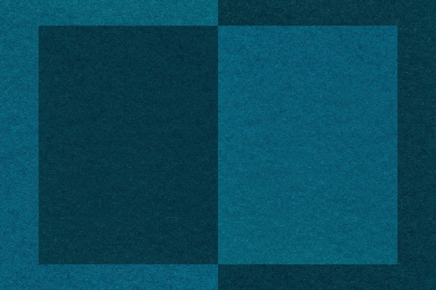 Textur aus marineblauem und türkisfarbenem Papierhintergrundmuster Struktur aus dunklem himmelblauem Karton mit Rahmen