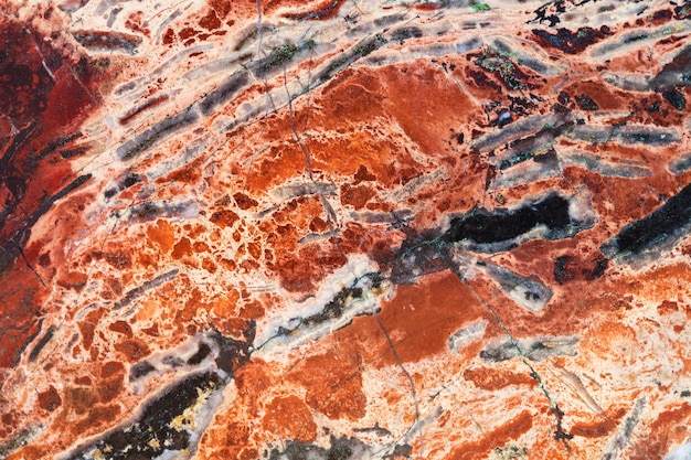 Textur aus rotem, brekziösem Jaspis-Mineral-Edelstein