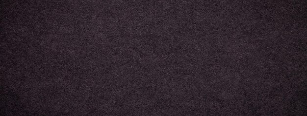 Foto textur der alten dunkelbraunen und schwarzen farben papierhintergrund-makro struktur von umber-karton
