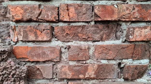 Textur der alten roten Backsteinmauer Nahaufnahme