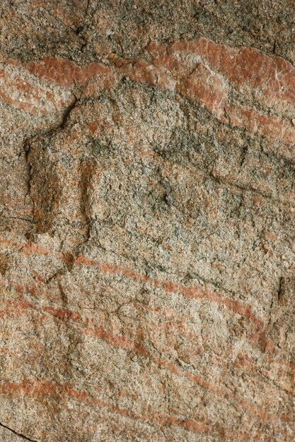 Textur der alten Steinfelsenoberfläche Brauner Stein oder Felshintergrund Nahaufnahme