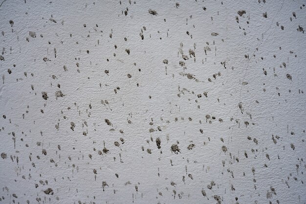 Textur der schmutzigen weiß gestrichenen Wand als Hintergrund.