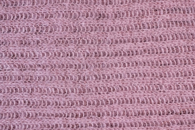 Textur des gestrickten rosa Schals