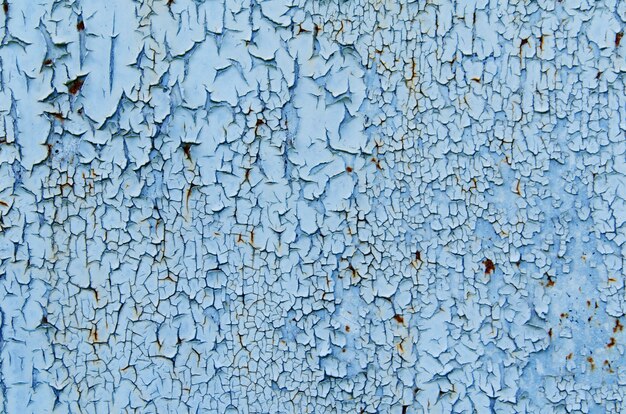 Textur des rostigen blauen und grauen Eisenwandhintergrunds der Weinlese mit vielen Farb- und Rostschichten