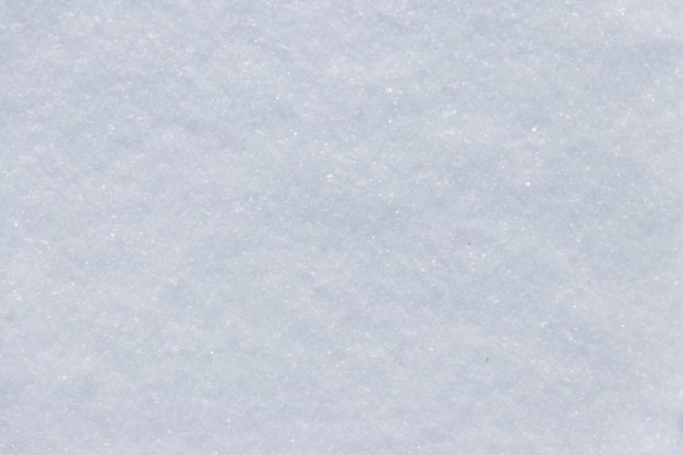 Textur des weißen Schnees. Winterhintergrund