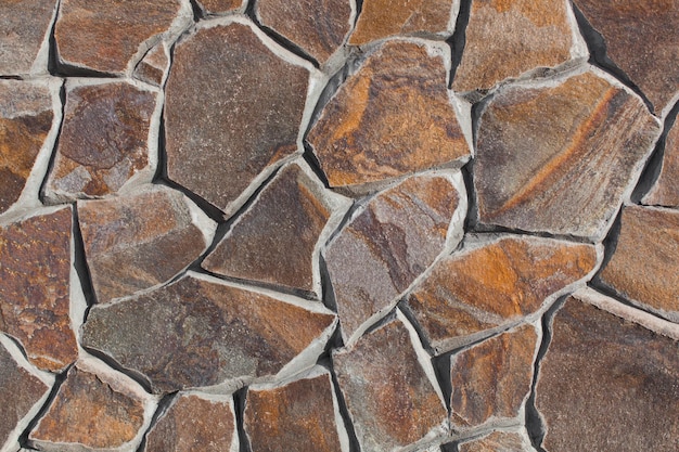 Textur einer Backsteinmauer aus Naturstein