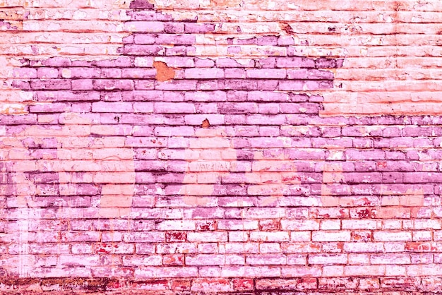 Foto textur einer backsteinmauer mit rissen und kratzern, die als hintergrund verwendet werden können