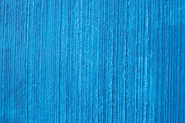 Textur einer verputzten Wand in blauem Konzepthintergrund gemalt