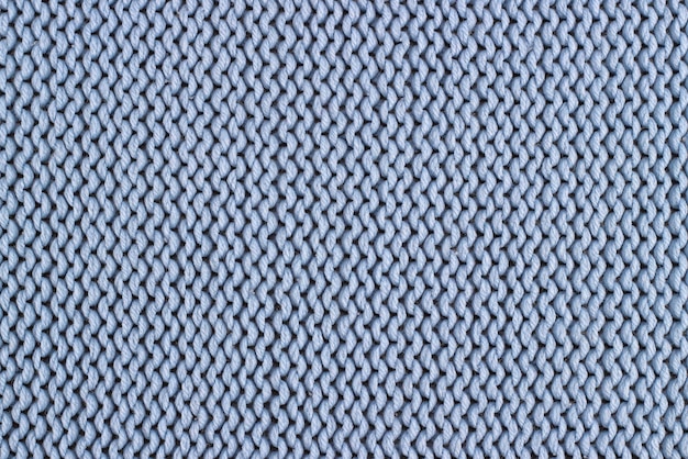 Textur eines blauen Strickpullovers