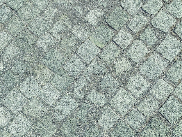 Textur kleine graue Steine liegen auf dem Straßenmaterial für den Bau von Straßenrändern und Straßen 3d